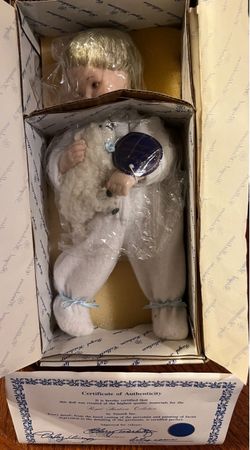 Baby Boy Doll holding small white Lamb