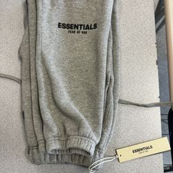 gray Fear of God Essentials sweatpants