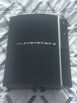 Sony PlayStation 3 80GB w/ Chords and Backpack.