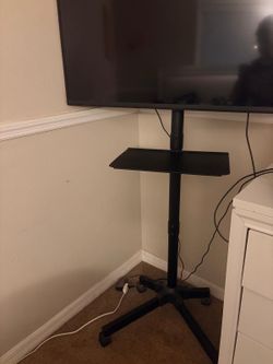 TV with a metal stand