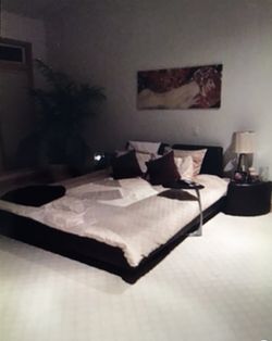 Dania floating bed frame with movable headboards