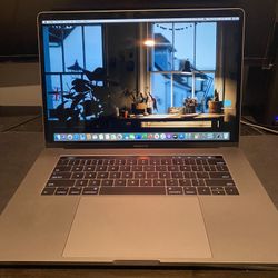 Macbook Pro 15” Retina display And Touchbar 