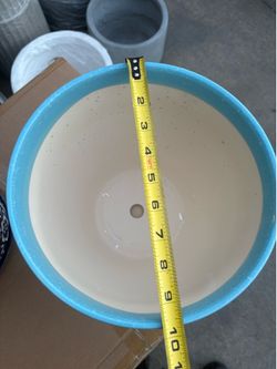 Ceramic flowerpots for quick sale at a low price.