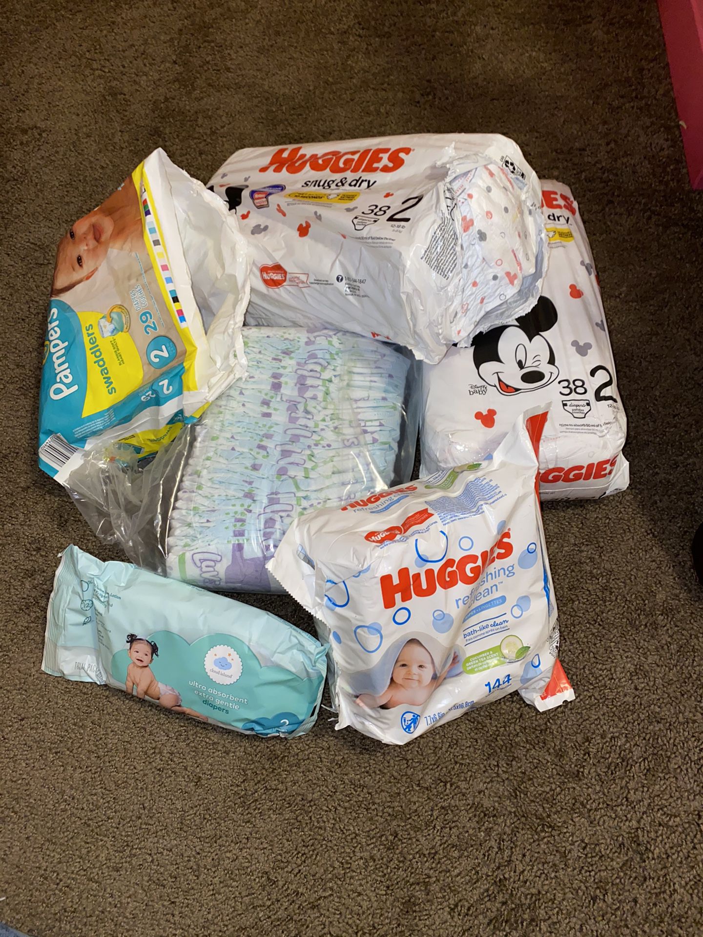 Lot of diapers (several brands) size 2