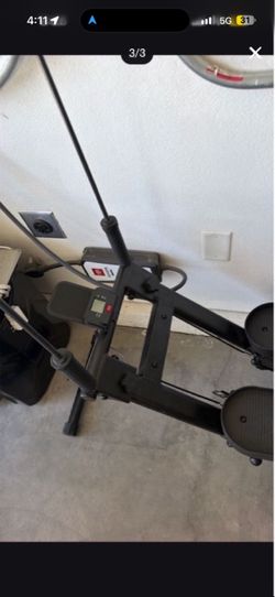 vertical exercise machine with a stable triangular structure