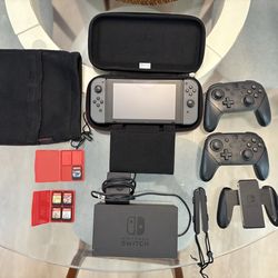 Nintendo Switch Bundle – 2 Controllers + Mario Kart + 5 Games