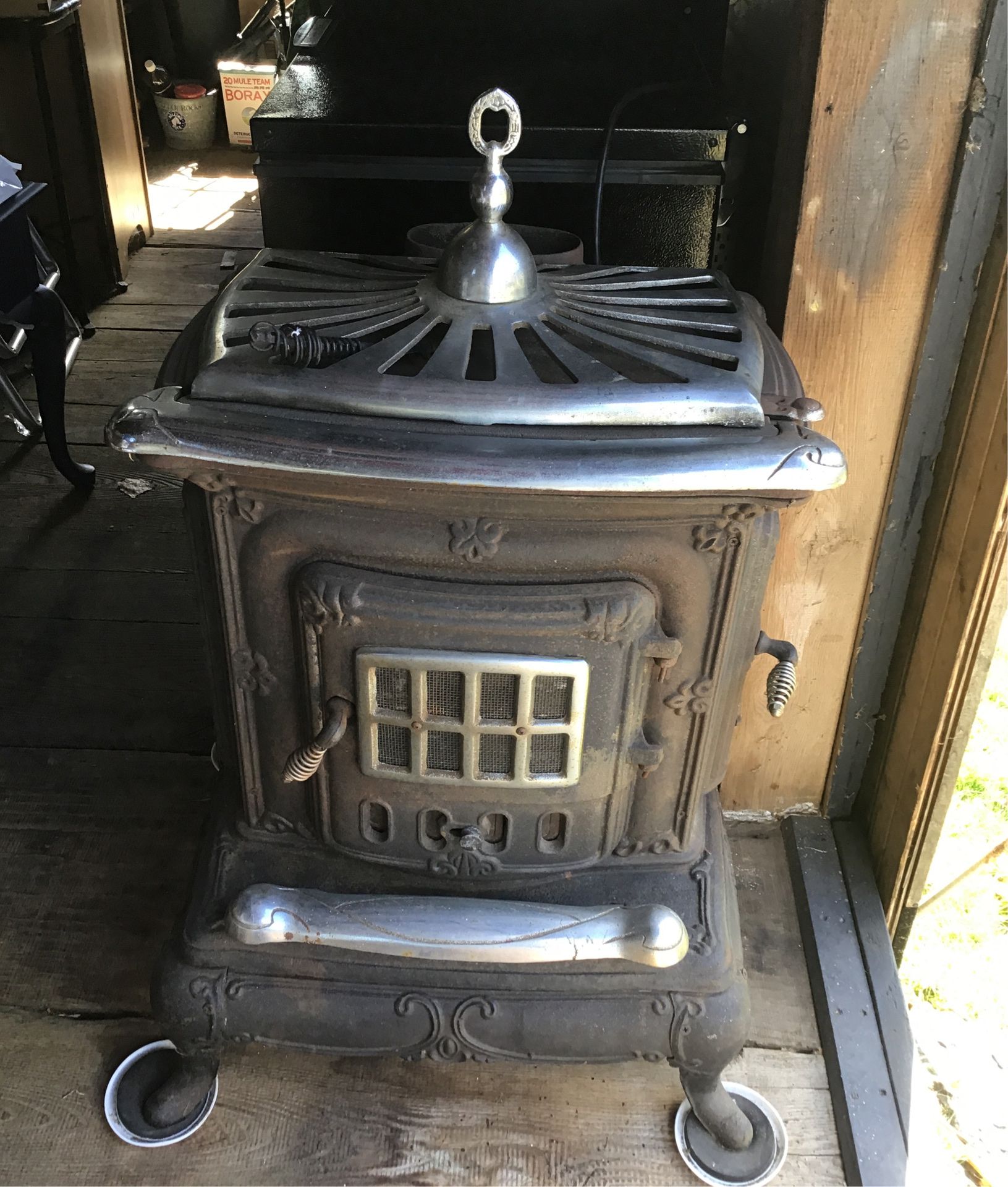 Antique wood burning parlor stove