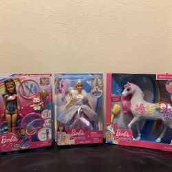 Assortment Of Barbie Dolls And Accessories