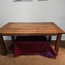 Solid wooden table in good condition. 