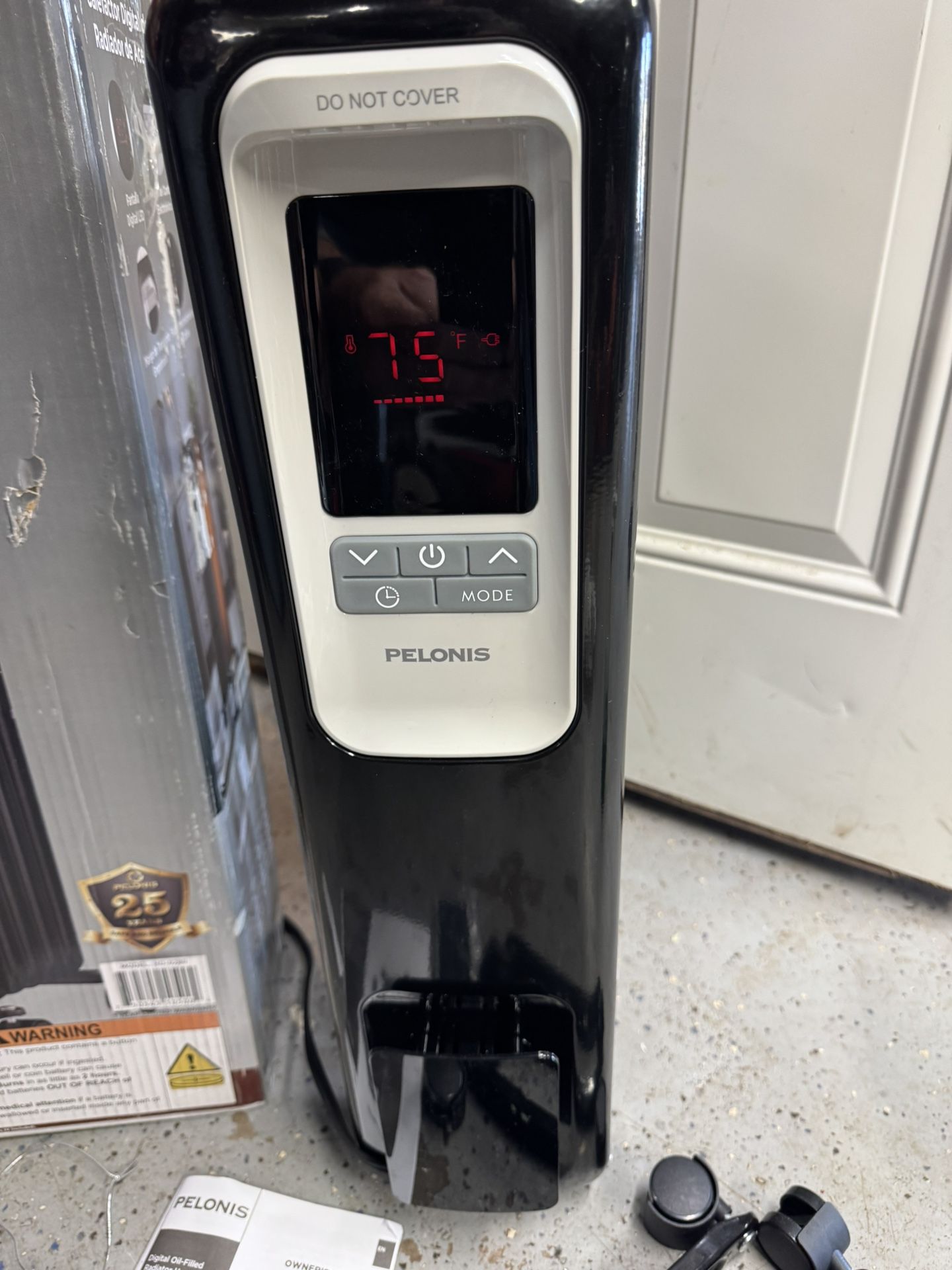 Brand New Pelonis Digital Oil Filled Radiator Heater 1500Watt With Remote. Must Pickup