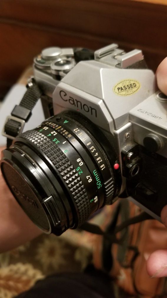 Canon ae-1 vintage camera and canon flash and thyristor vivitar