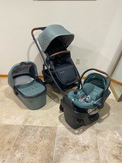 Uppababy V2 Stroller with bassinet and Aria car seat exp 2031