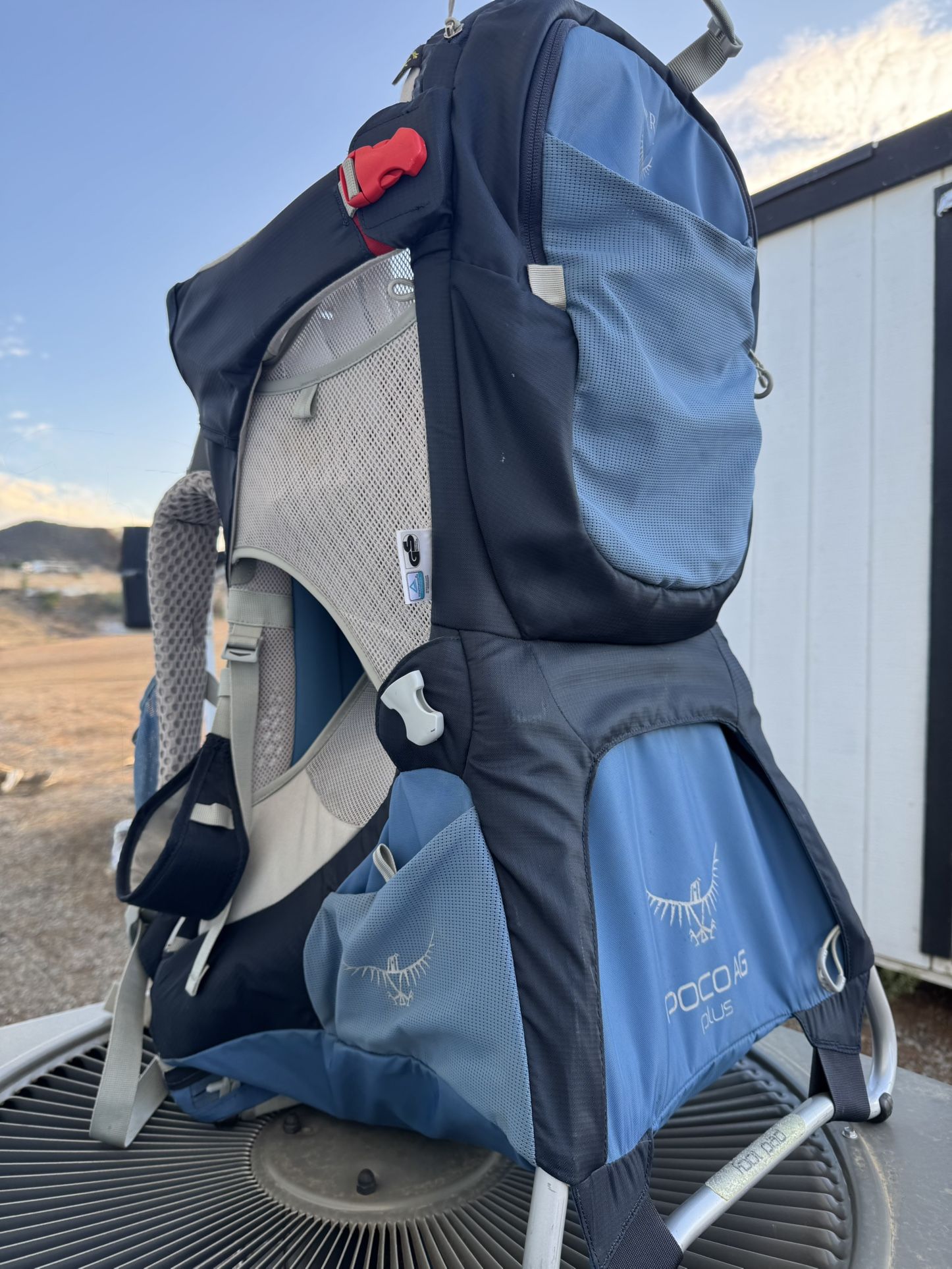 Two Osprey Hiking Child Carrier Backpacks