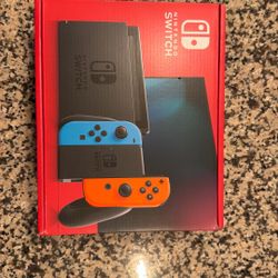 Switch with Neon Blue and Neon Red Joy‑Con - Nintendo Switch