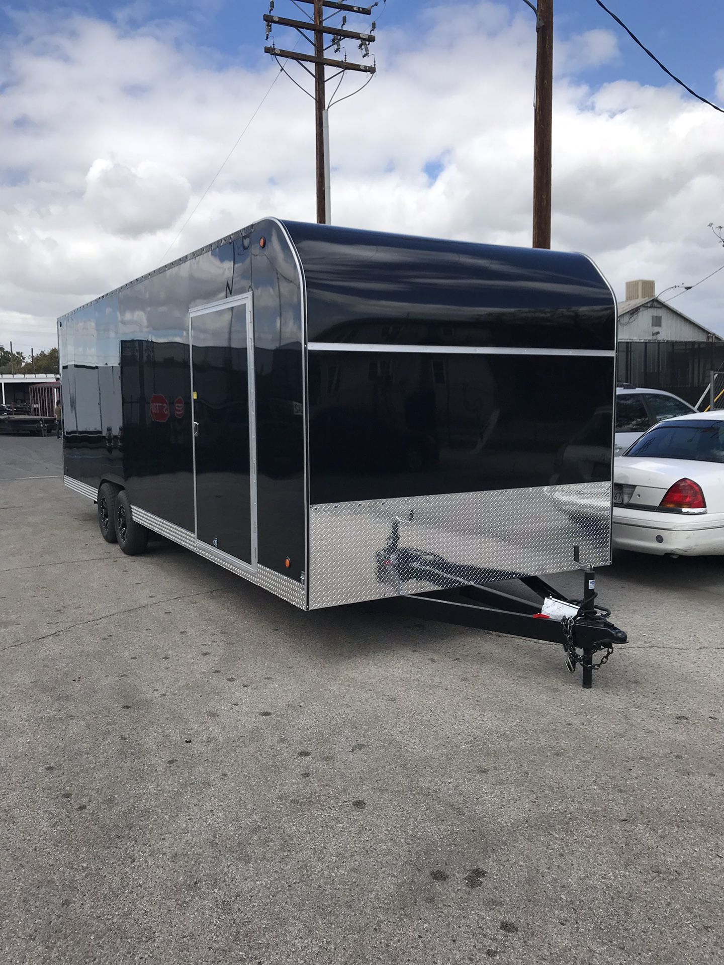 Blacked out 8.5x24x7 enclosed trailer