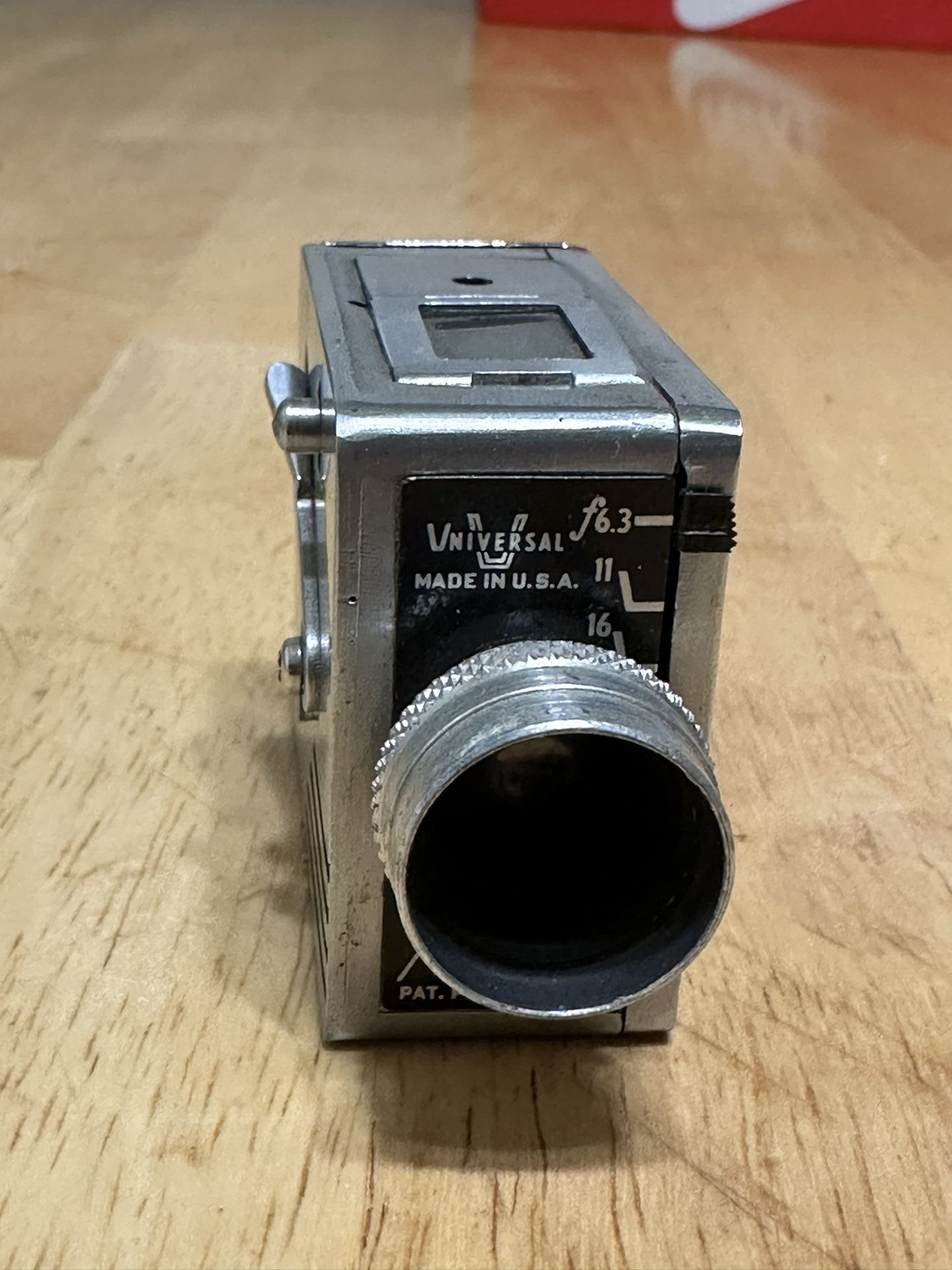 Vintage Universal Minute 16 Movie Camera – Made in USA  Classic miniature 16mm movie camera from the 1940s–50s. Features f/6.3 lens, sturdy metal body