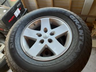 Set of 5 Rims and Tires Jeep Wrangler
