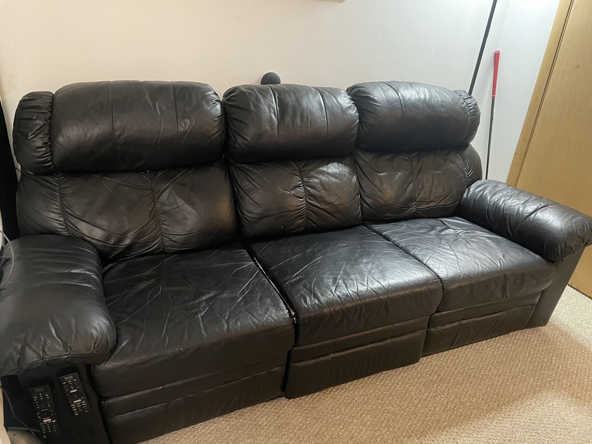 Black leather reclining sofa
