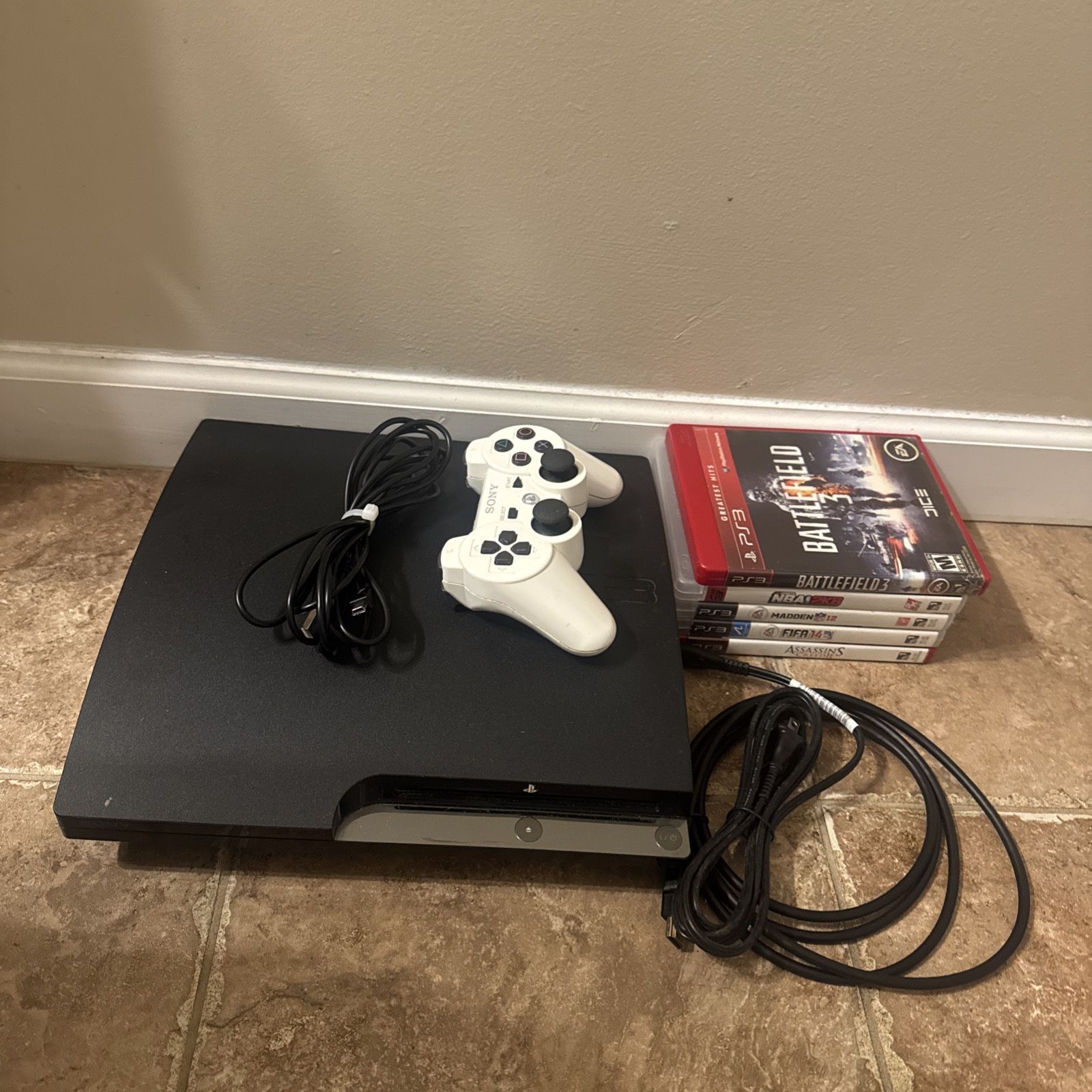 ps3 with games and controller