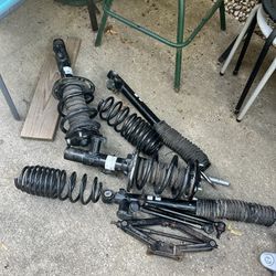 Front and Rear, Driver and Passenger Side Loaded Strut