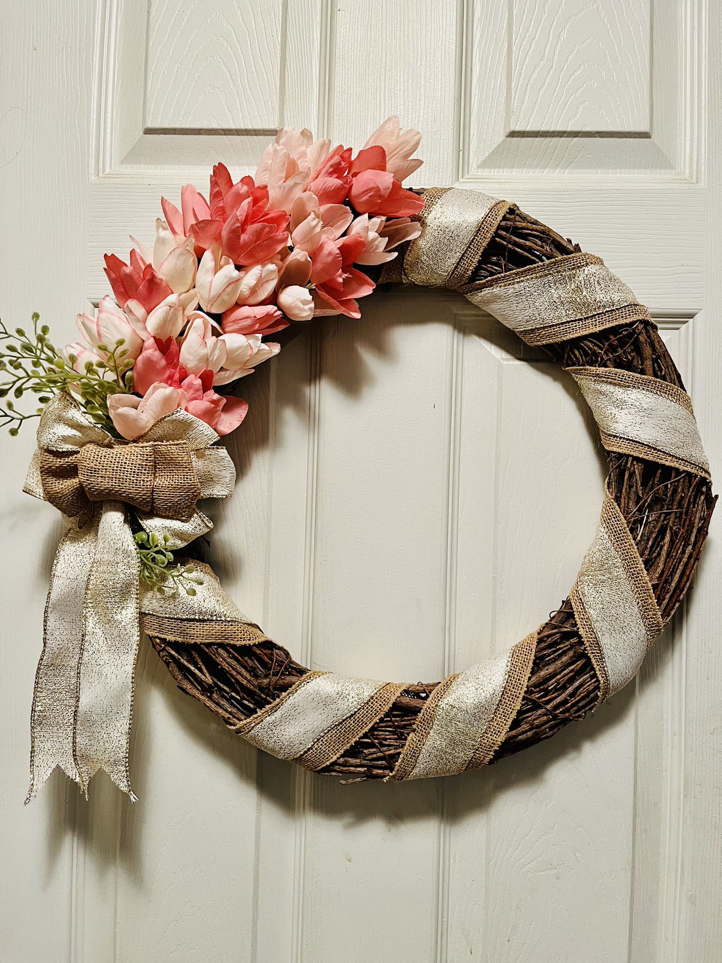 Spring elegant wreath. New. 18”from left to right. Comes in its own box. (Brown) ships from a smoke free environment.  