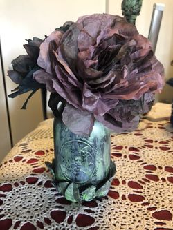 Handmade flowers with painted jar