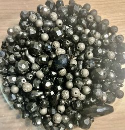 Vintage Black gemstones, glass, matted and trinkets beads. All different sizes and shapes. All loose beads. As is. No returns. Make me an offer I can’