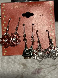 three pairs of dangle earrings