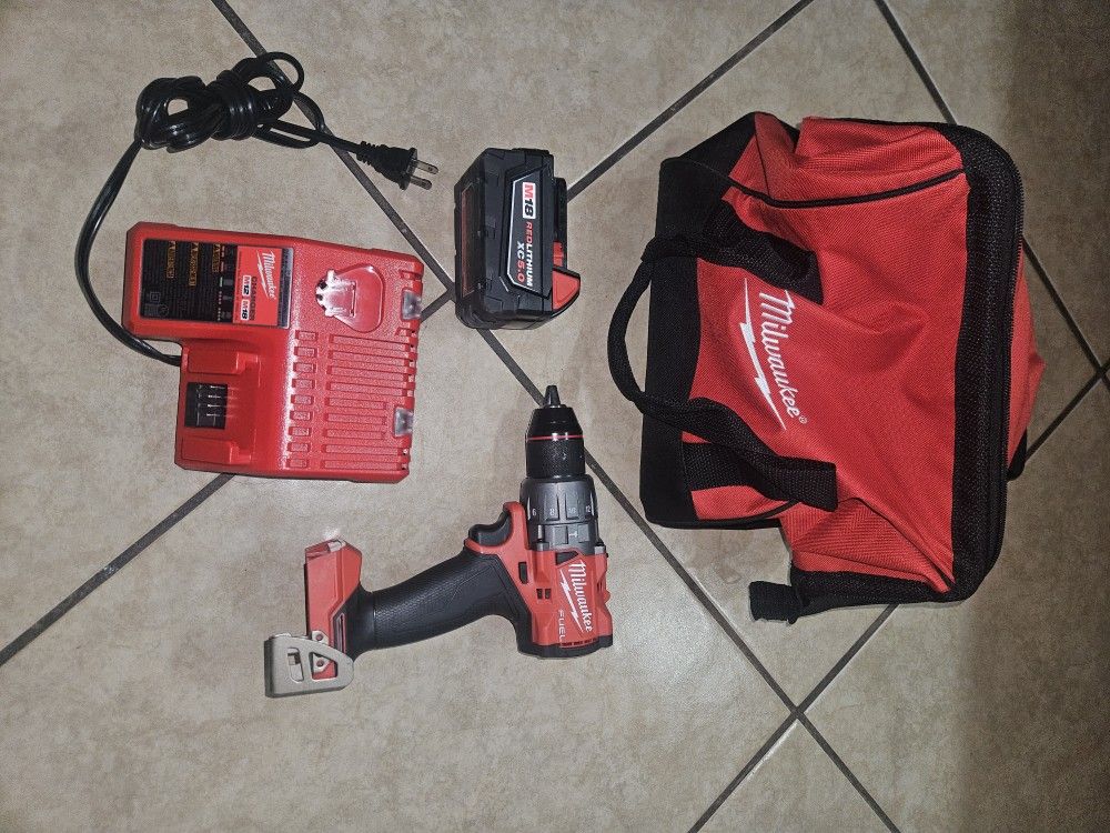 Milwaukee Hammer Drill And 5.0 Battery And Charger