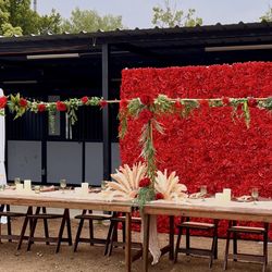 Over The  Table Gold Rod With Greenery And Red Roses 