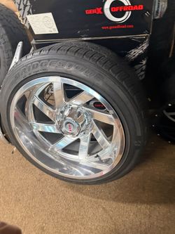 22x12 new aluminum wheels on (contact info removed) tires wheels never been used tires are in great shape 6 lug chevy ford 6x139 6x135
