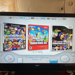 NINTENDO WII + 30 WII GAMES MARIO KART,MARIO OARTY 9,WII SPORTS,SMASH BROS. and More