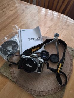 NIKON D3000 WITH ADDITIONAL LENS AND TRIPOD