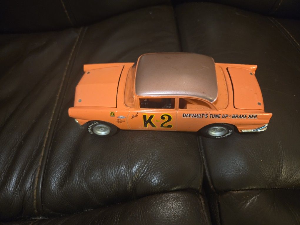 The diecast car pictured is a Dale Earnhardt K-2 1956 Ford Victoria in 1:24 scale.