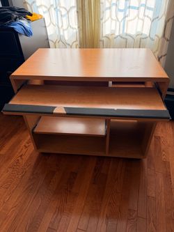 Light Brown Desk with wheels and retractable shelves