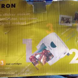 Xyron. Never used. perfect for Arts n crafts