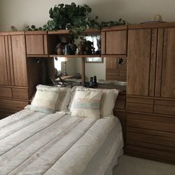 Orman Grubb Oak Finish Pier Wall System with matching dresser.