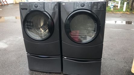 Kenmore front load washer dryer with pedestals and shoe rack