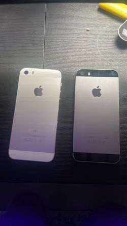 2 old iPhones 1 grey/black 1 white/grey