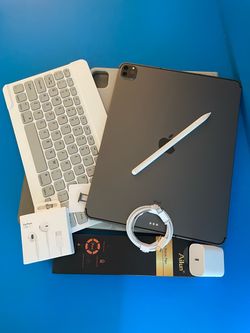 Apple IPad Pro 12.9” 5th Generation ( M1 chip / XDR display / 2021) 128GB WiFi + cellular (5G/Unlocked) with keyboard, pen & Accessories