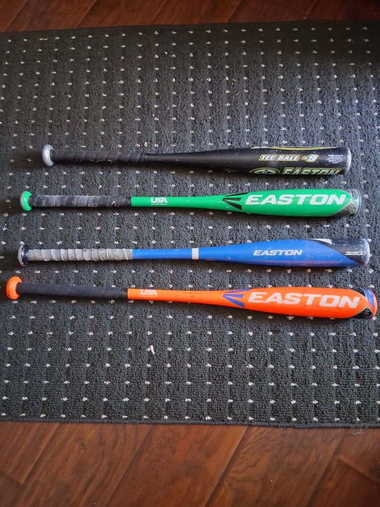 1 Tee Ball Bat.  3 Baseball Bats