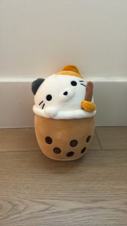 Kitten coming out of boba plushie.