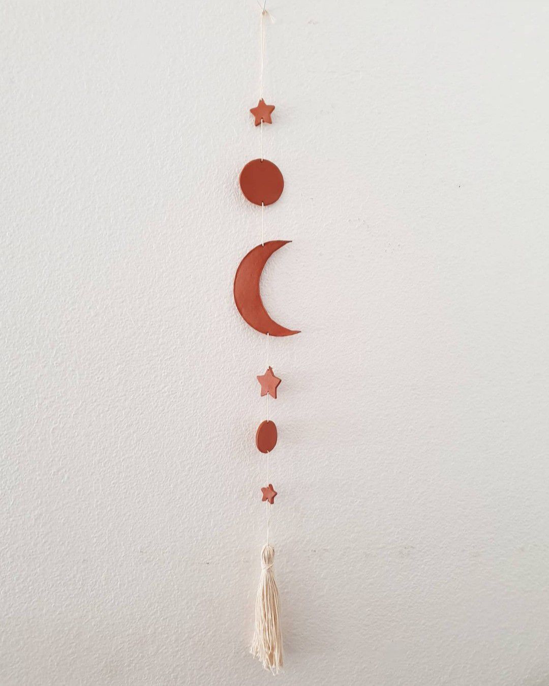 Moon star boho wall hanging decor. Made of clay and twine.