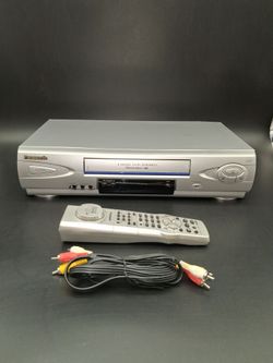 Panasonic VCR with remote and cable.  Works fine!