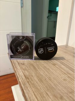 Eetu Luostarinen signed NHL hockey puck and Official game puck from 2023 NHL Finals