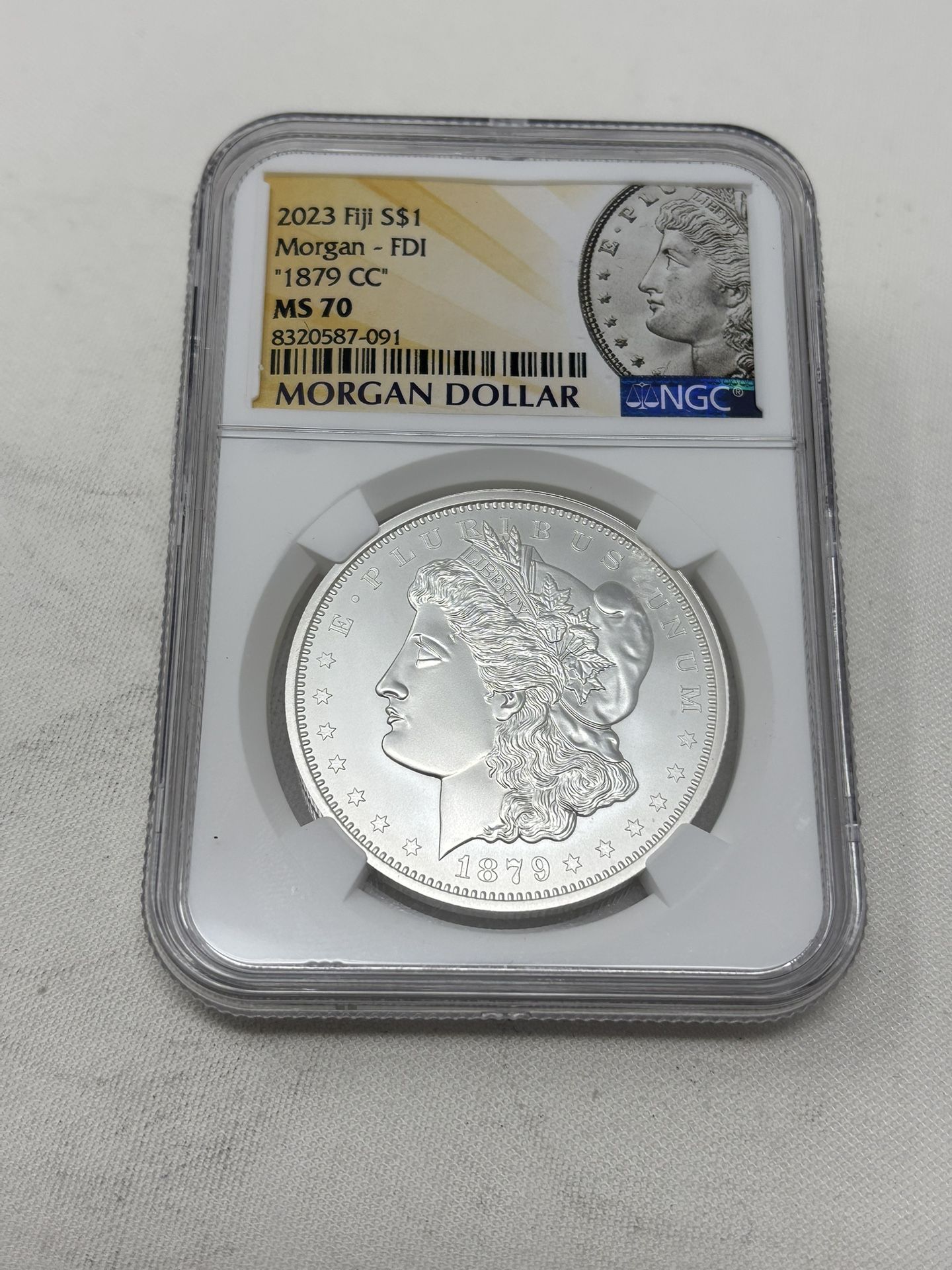 1879 – CC Morgan, Silver Dollar by Fiji MS – 70