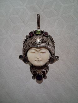 Sterling silver and amethyst balinese goddess pendant