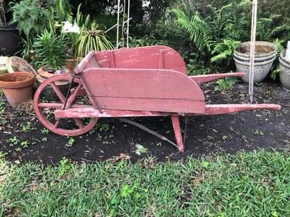 Antique wood wheelbarrow