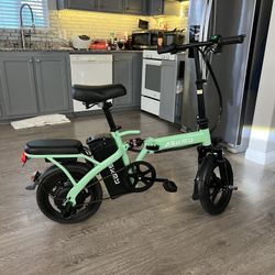  Green Folding electric bike-powerful motor, fast speed, Peak 48V 800W 14-inch tires, commuter-friendly, light weight, long-lasting battery Portable E