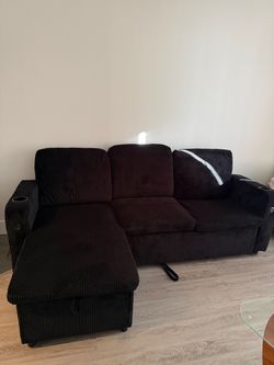 Brand new 84” L shape black couch with storage